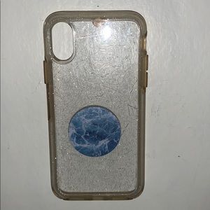 A clear sparkled case with pop socket